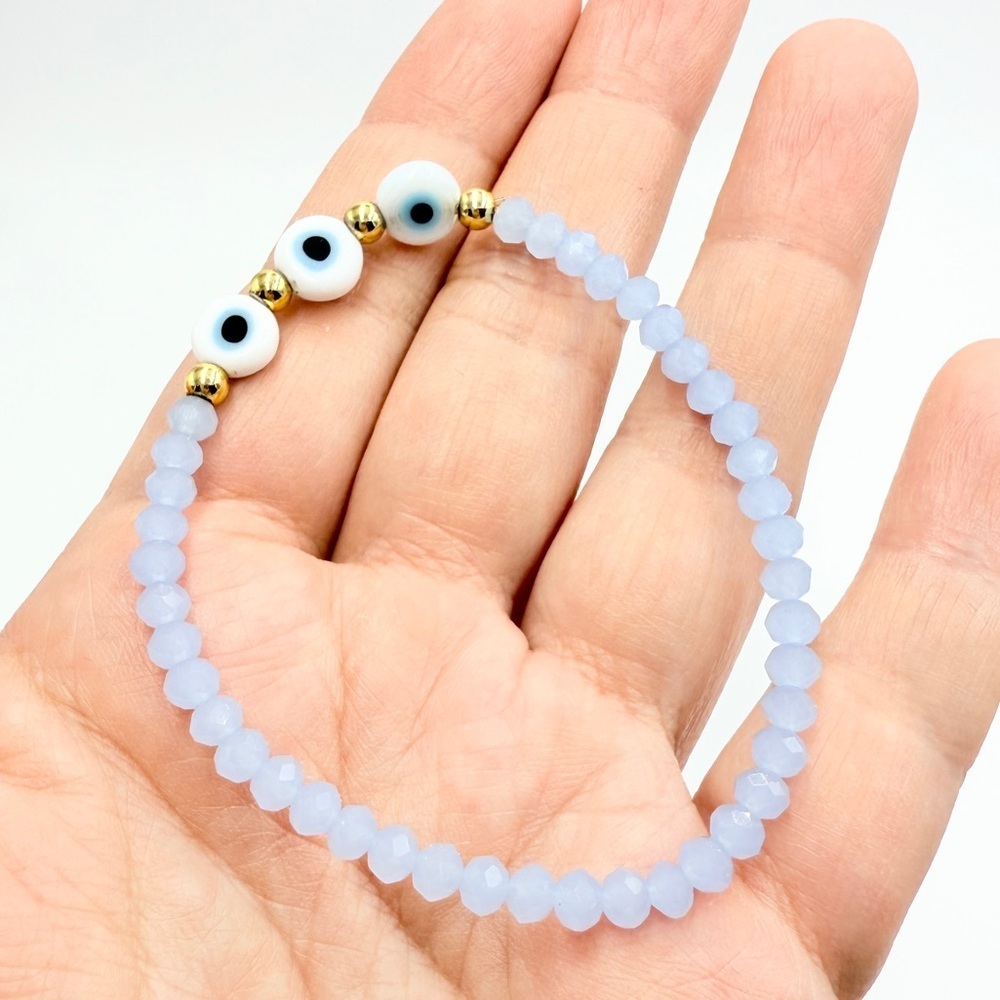 Blue Faceted Bead Evil Eye Stretch Bracelet with Gold-Tone Accents